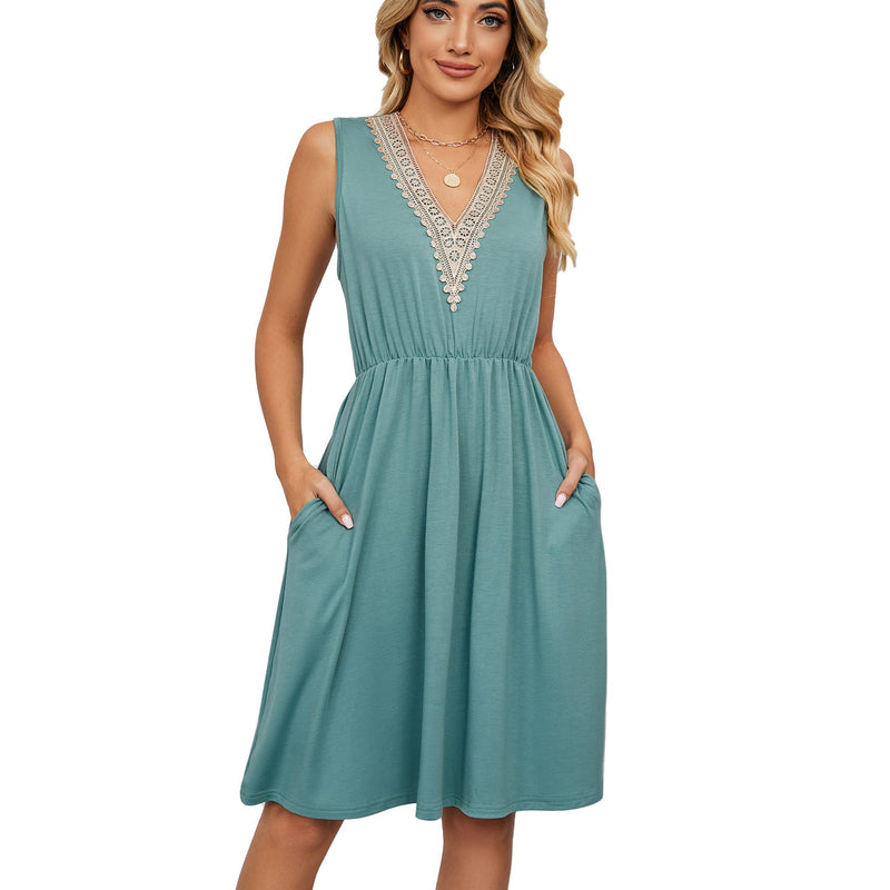 Sleeveless V-neck dress with lace details, pockets, and A-line skirt in green.