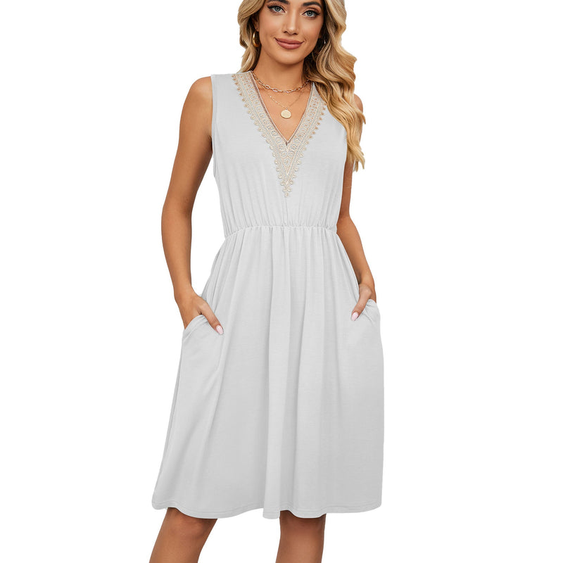 Sleeveless V-neck dress with lace details and pockets, featuring an A-line skirt and elastic waist for elegance and comfort.